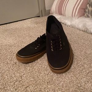Black and gold vans